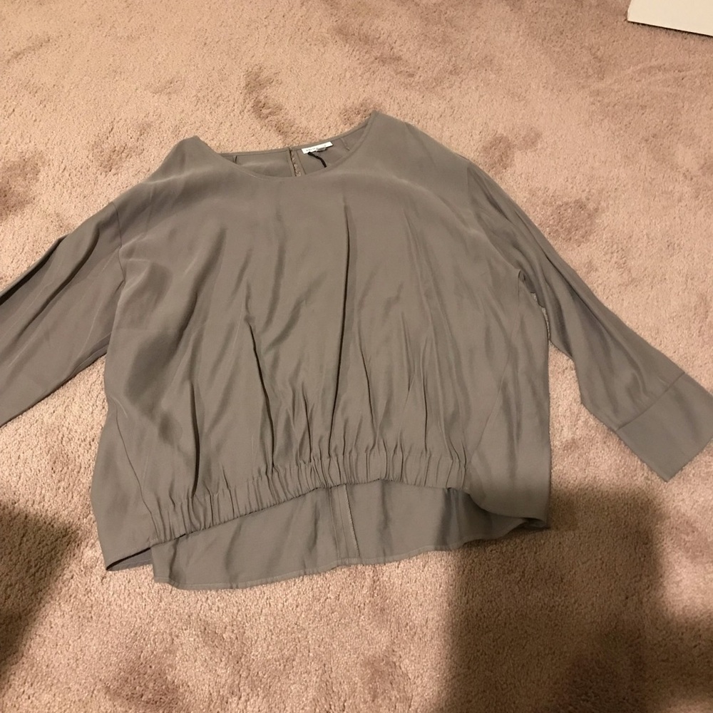 Long sleeve high low blouse with key hole button back closure